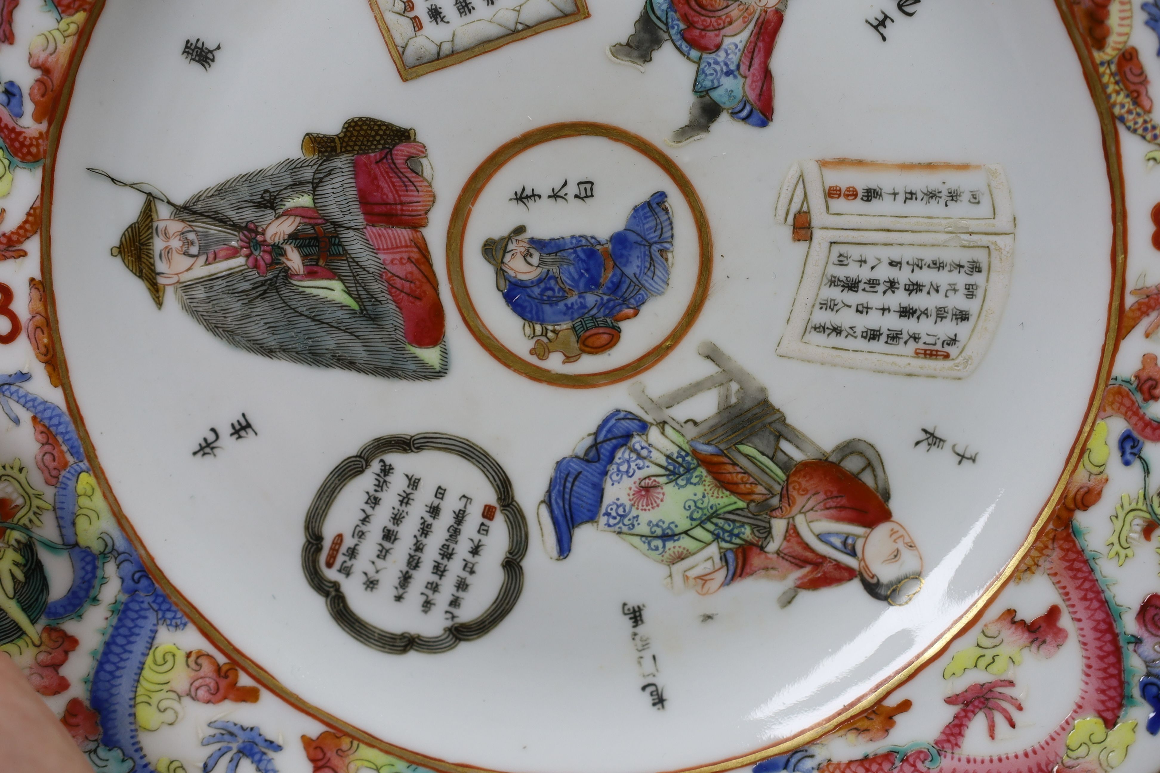 Two fine Chinese famille rose fencai dishes, 19th century, 24cm diameter